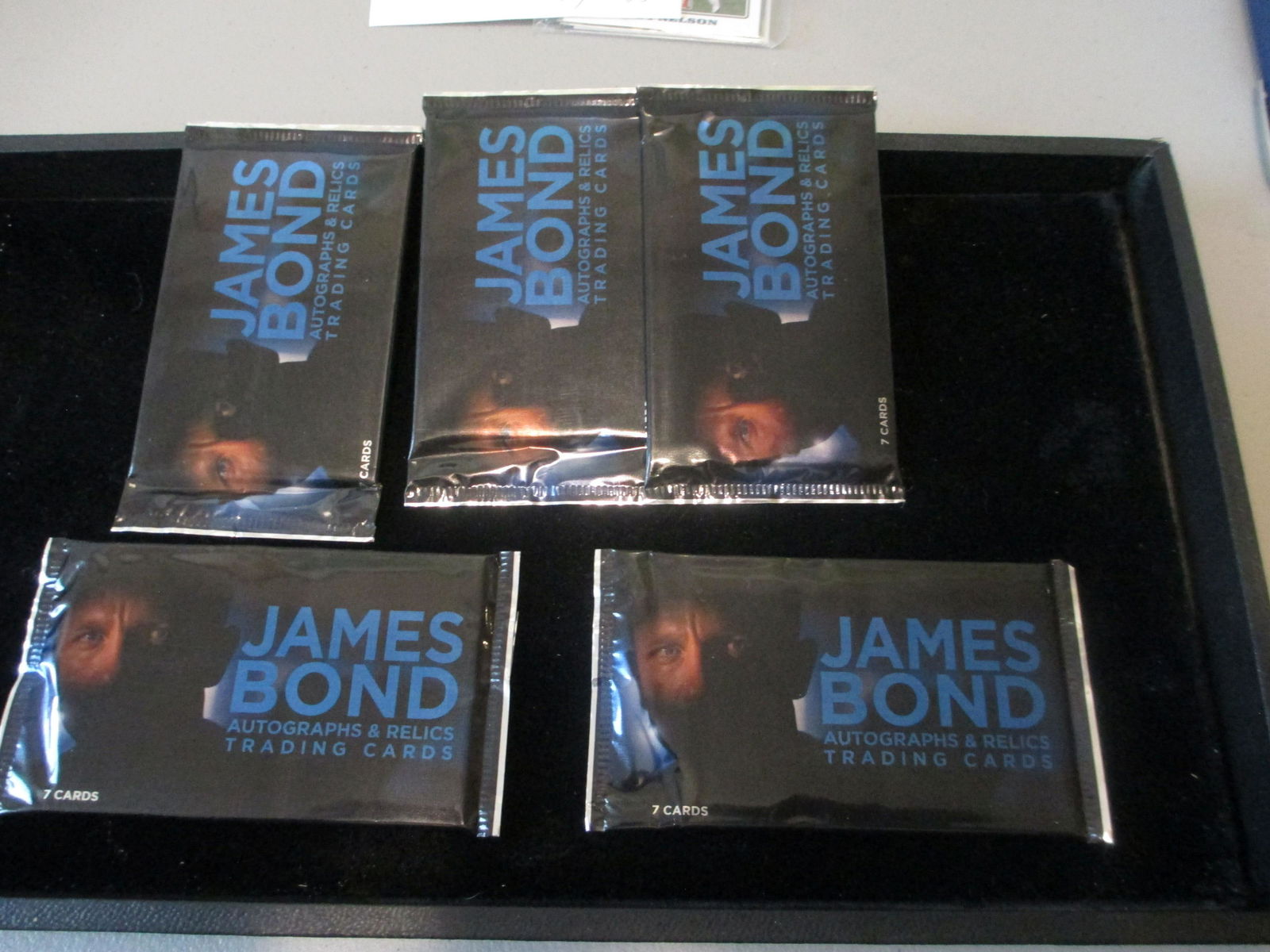 lot of 5 unopened packs of james bonds cards (1 of 1)