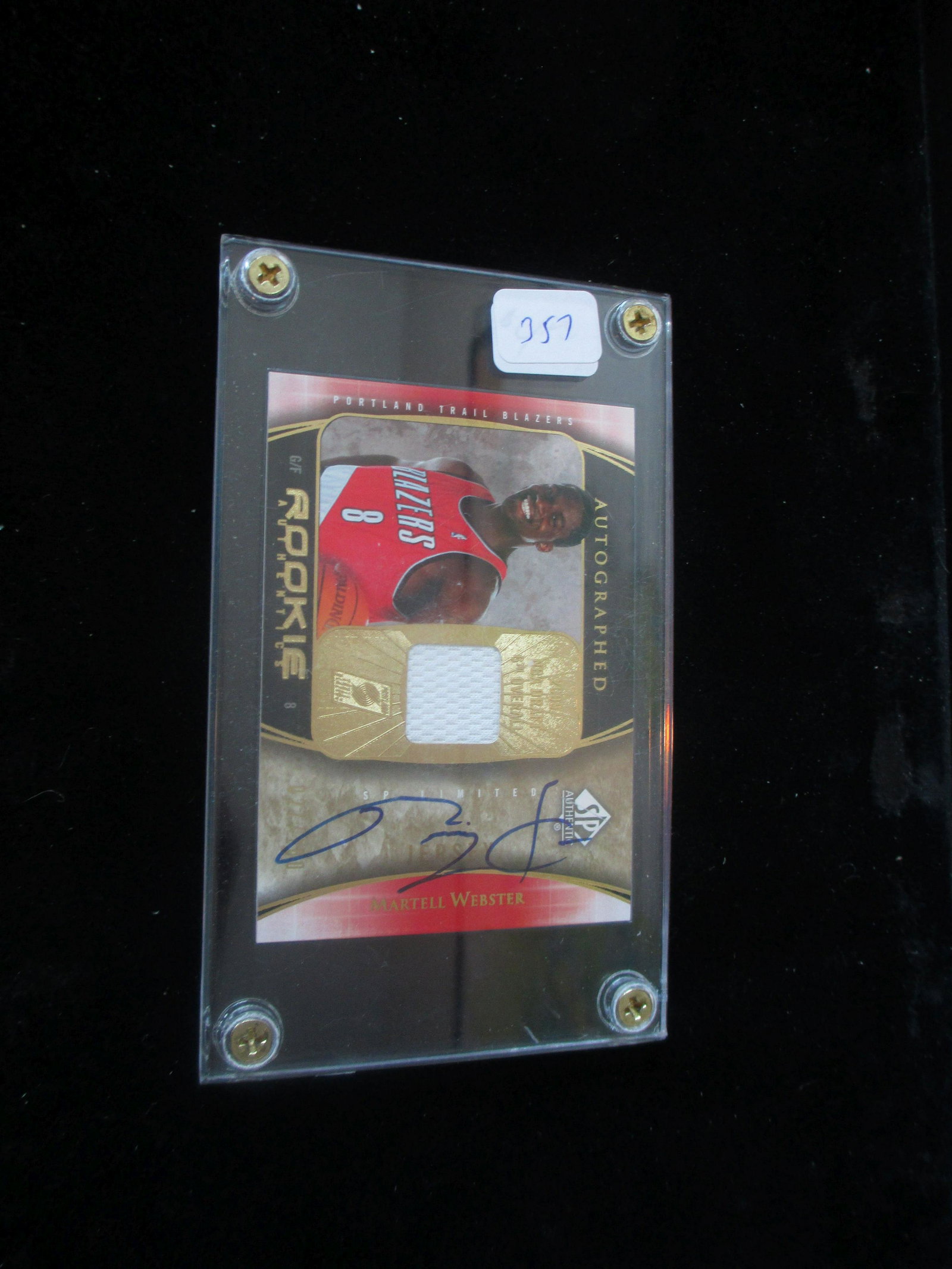martell webster jersey and signature card numbered: in hard plastic screw down holder