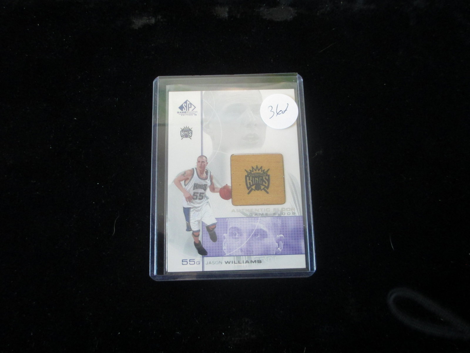 jason williams piece of floor card: in top loader