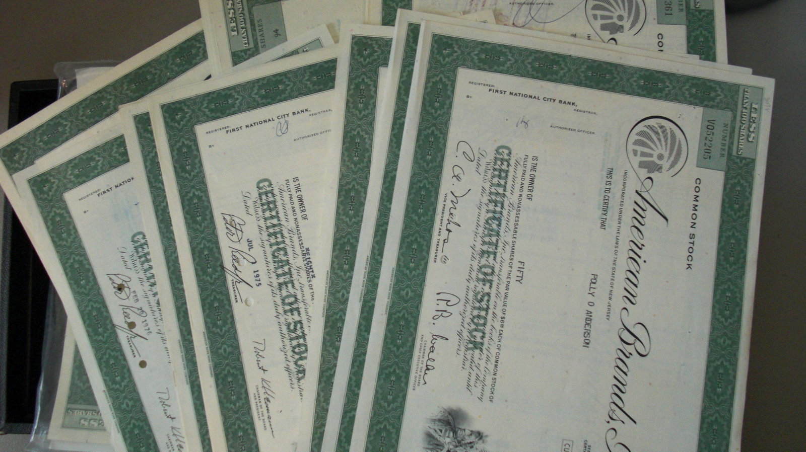 lot of 100 american brands inc stock certificates: rare hoard