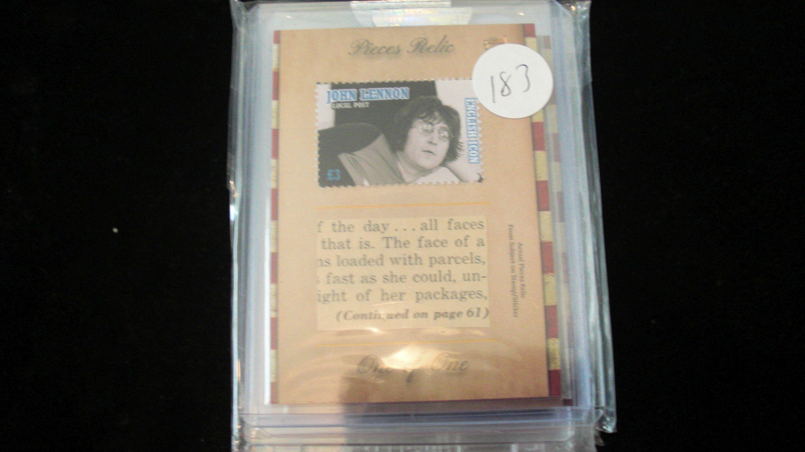 the bar john lennon stamp and relic: authentic in top loader