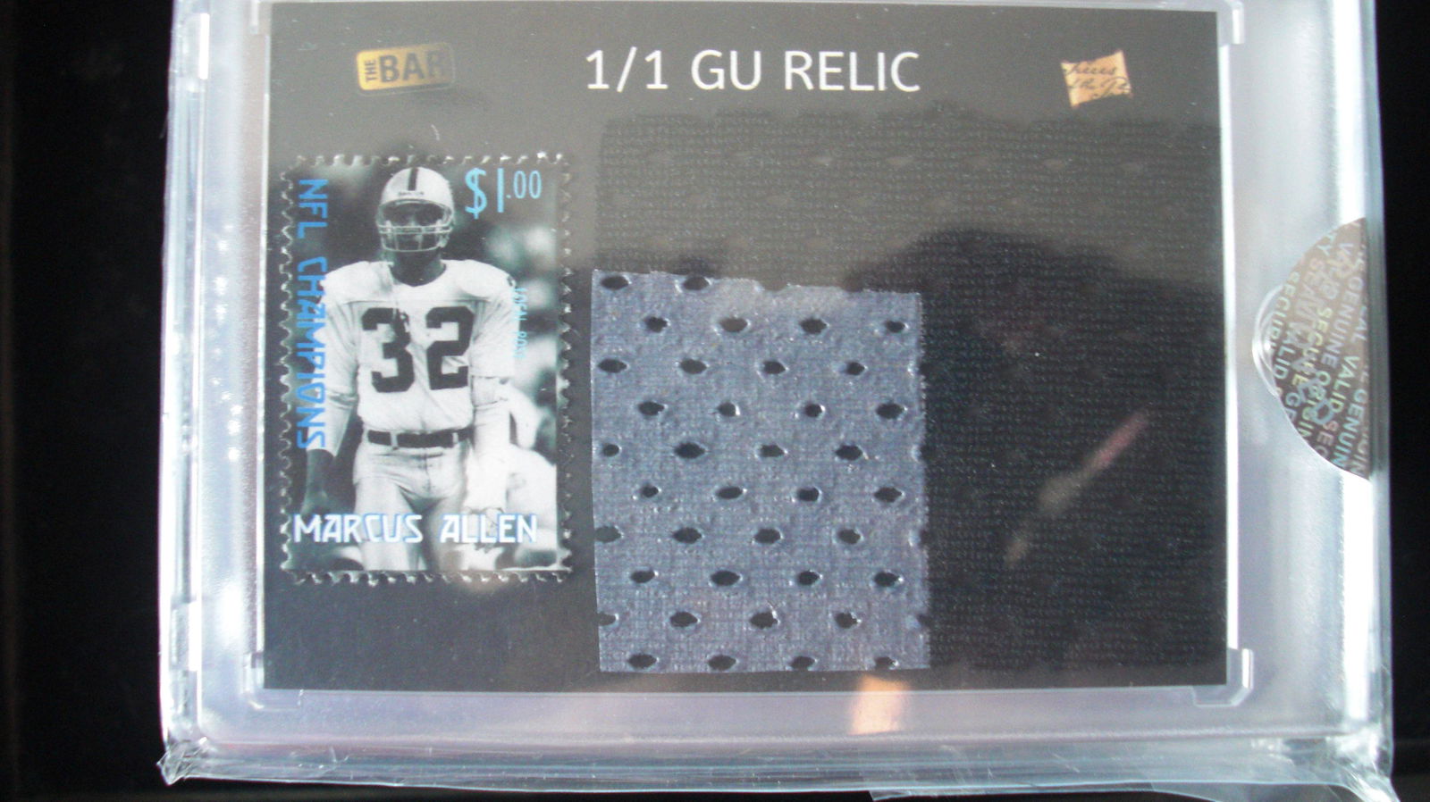 the bar 1/1 marcus allen stamp and jersey patch relic (1 of 1)