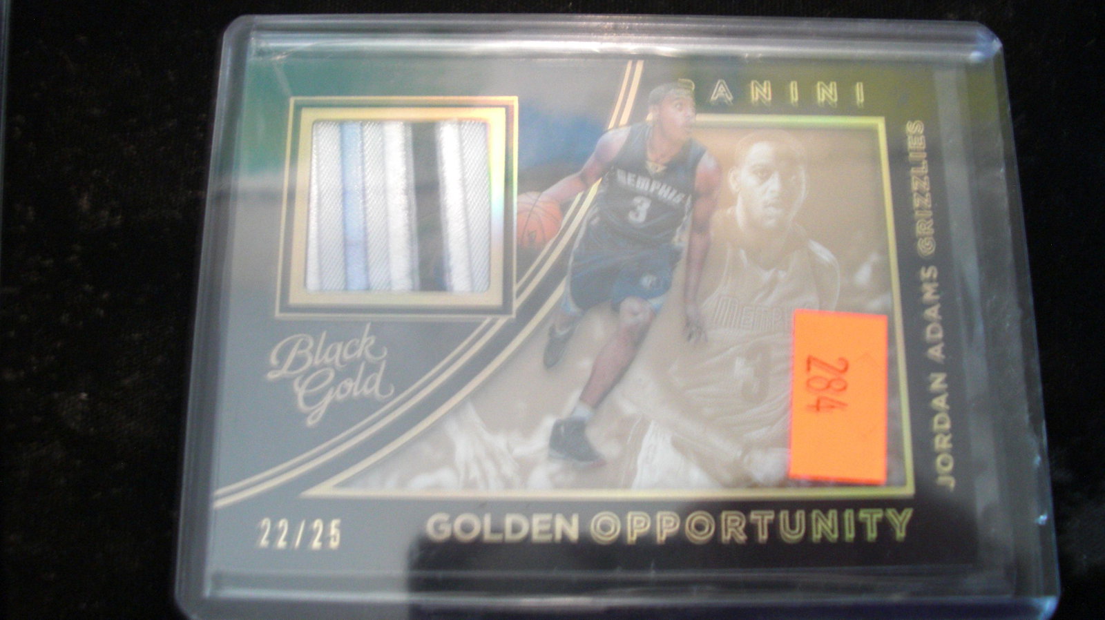 black gold #22/25 jersey jordan adams: in top loader