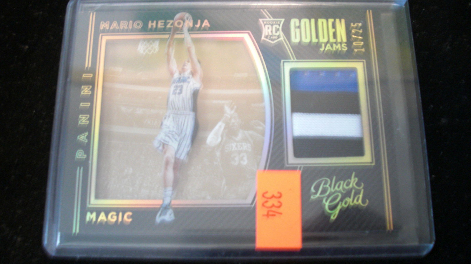 black gold rookie 10/25 mario hezonja jersey: in top loader