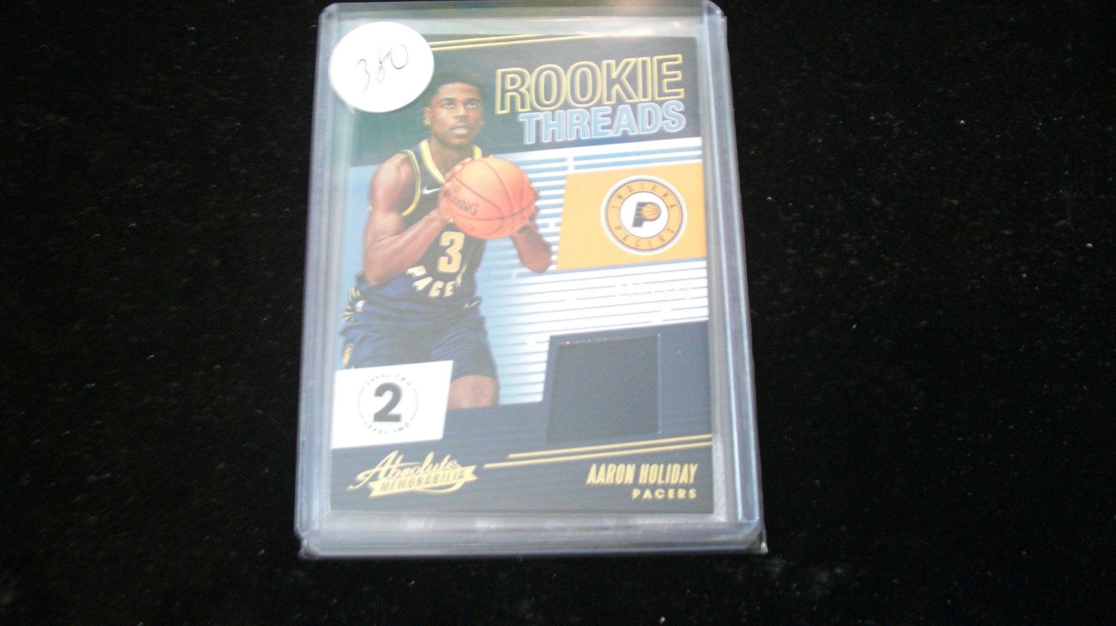 aaron holiday jersey #066/149: in top loader