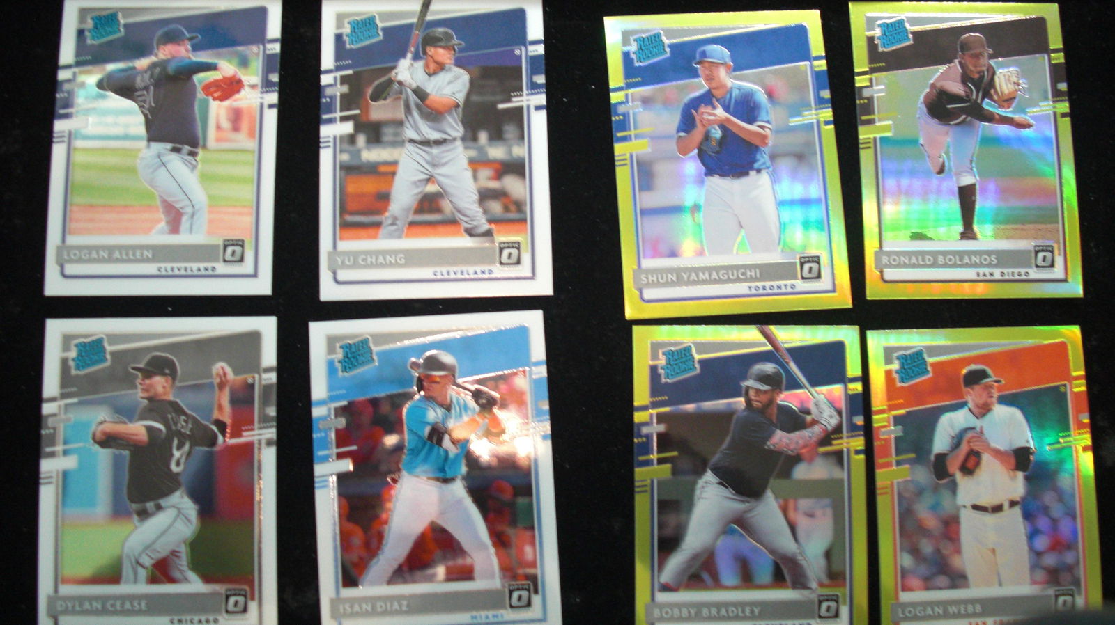 lot of 4 green and 4 white rated rookie optic cards (1 of 1)