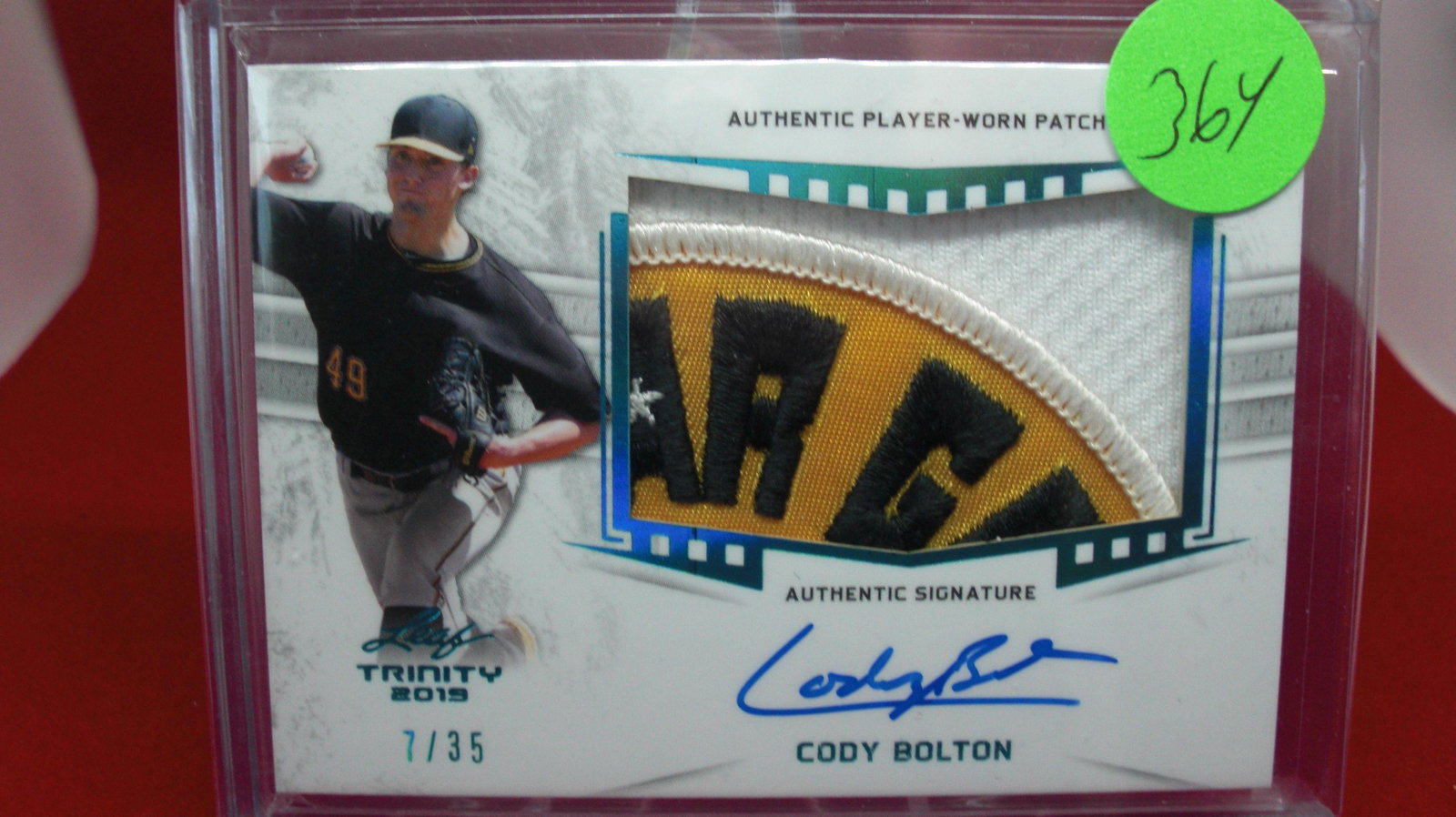 cody bolton signature/jersey #7/35: in top loader