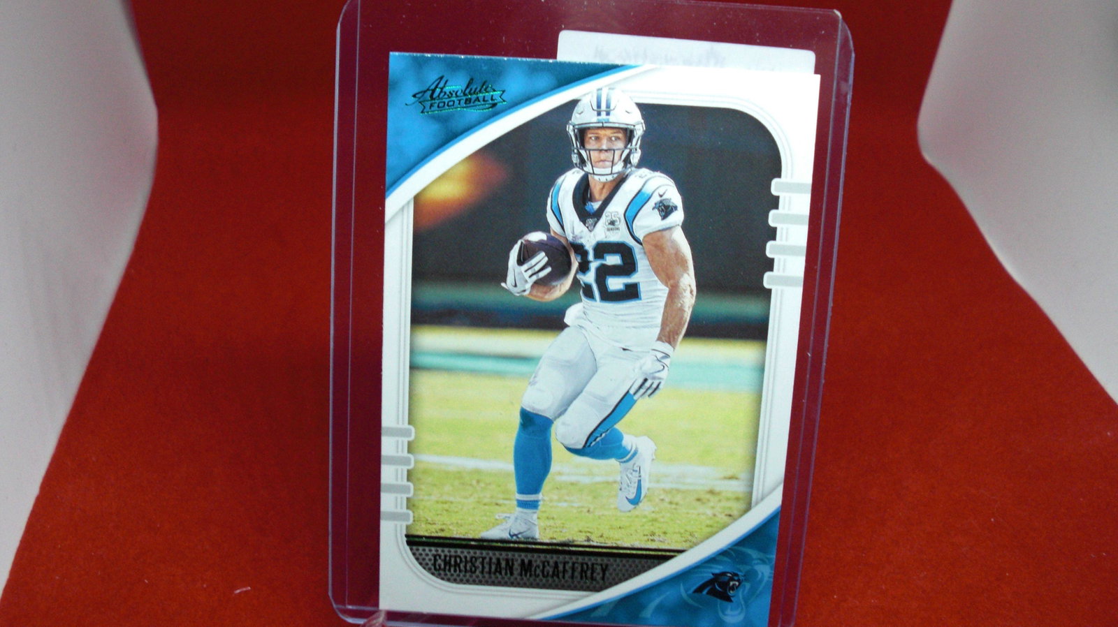 chritian mccaffrey panthers: in top loader