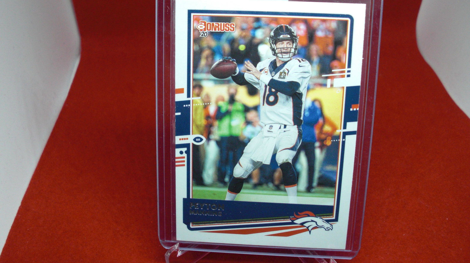peyton manning: in top loader