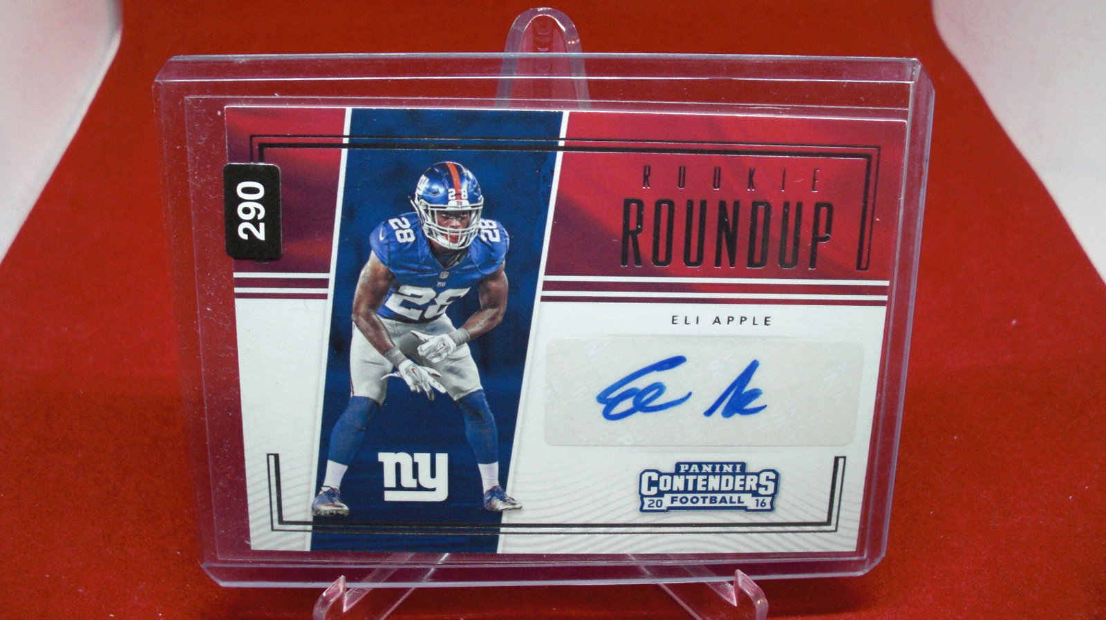 eli apple signature rookie: in top loader