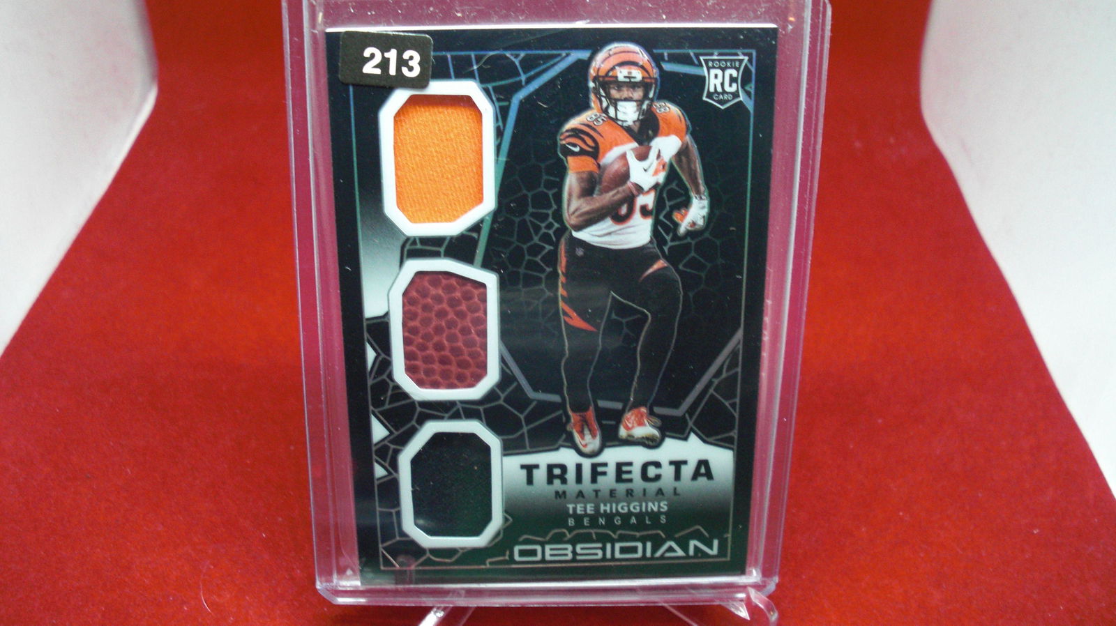 tee higgins rookie trifecta obsidian hits relic: in top loader