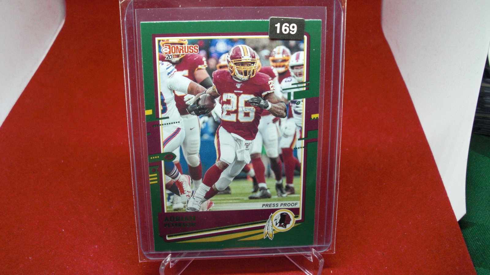 adrian peterson: in top loader