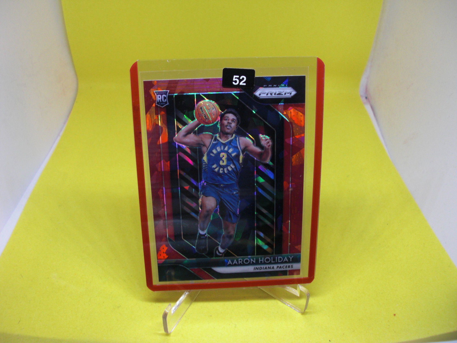 aaron holiday red rookie prizm: in top loader