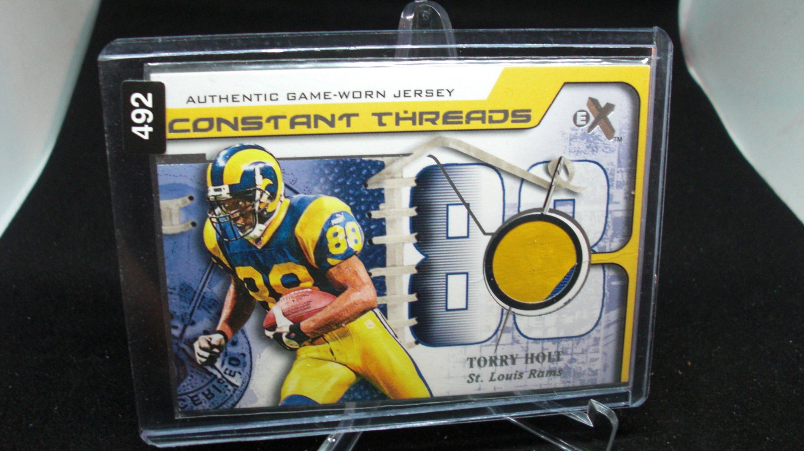 torry holt jersey: in top loader