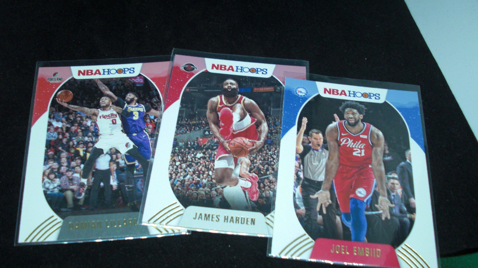 2020-21 NBA HOOPS HOLIDAY GOLD NAME-PLATE VARIATION: JOEL EBIID, JAMES HARDEN, NIKOLA JOKIC, DAMIAN LILLARD