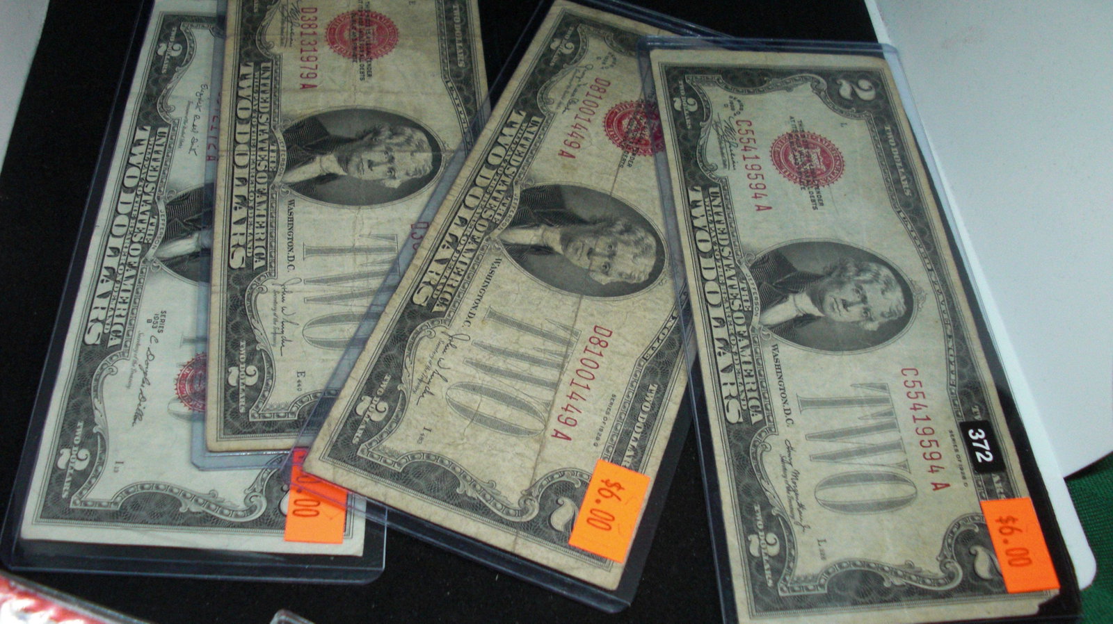 lot of 4 $2 red seals: in nice holders