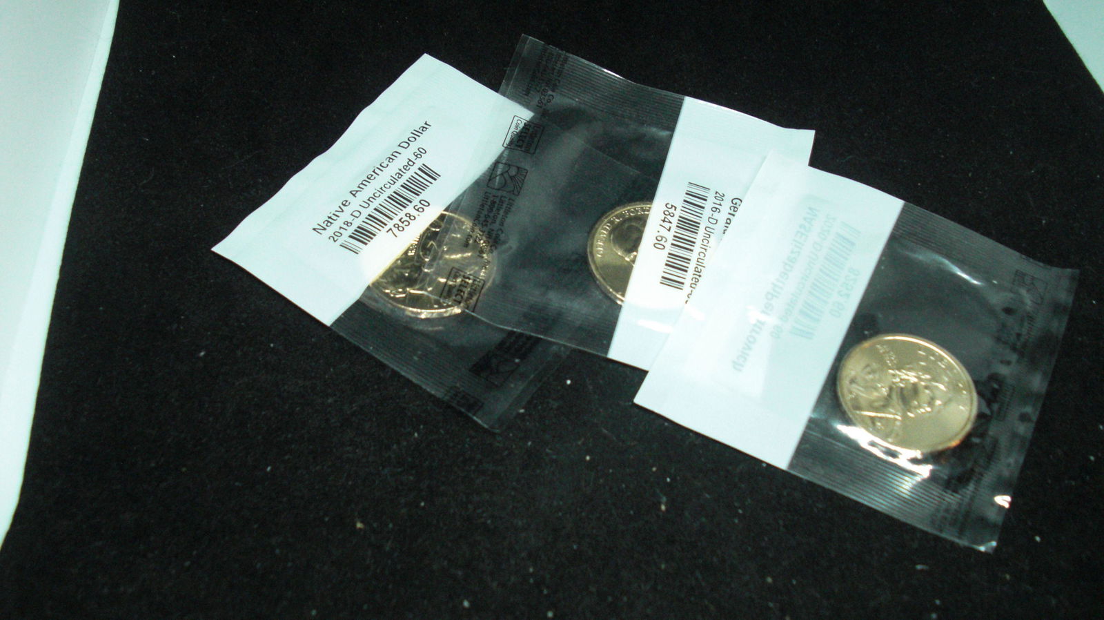 lot of 3 uncirculated us dollar coins (1 of 1)