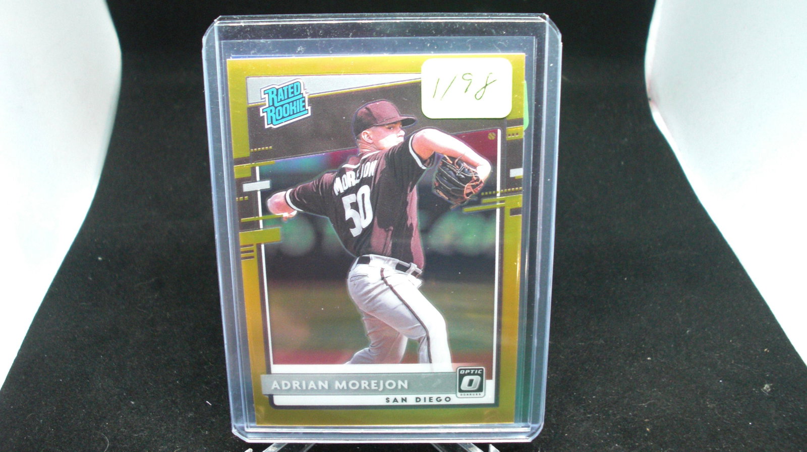 adrian morejon gold rated rookie 06/10: in top loader