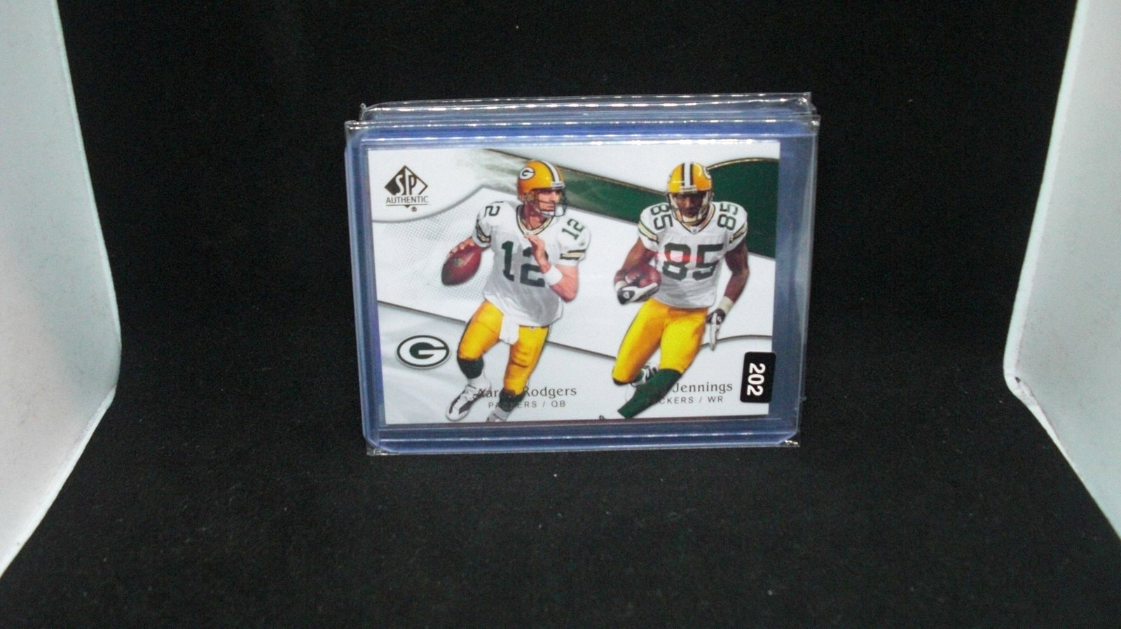 aaron rodgers combo card: in top loader