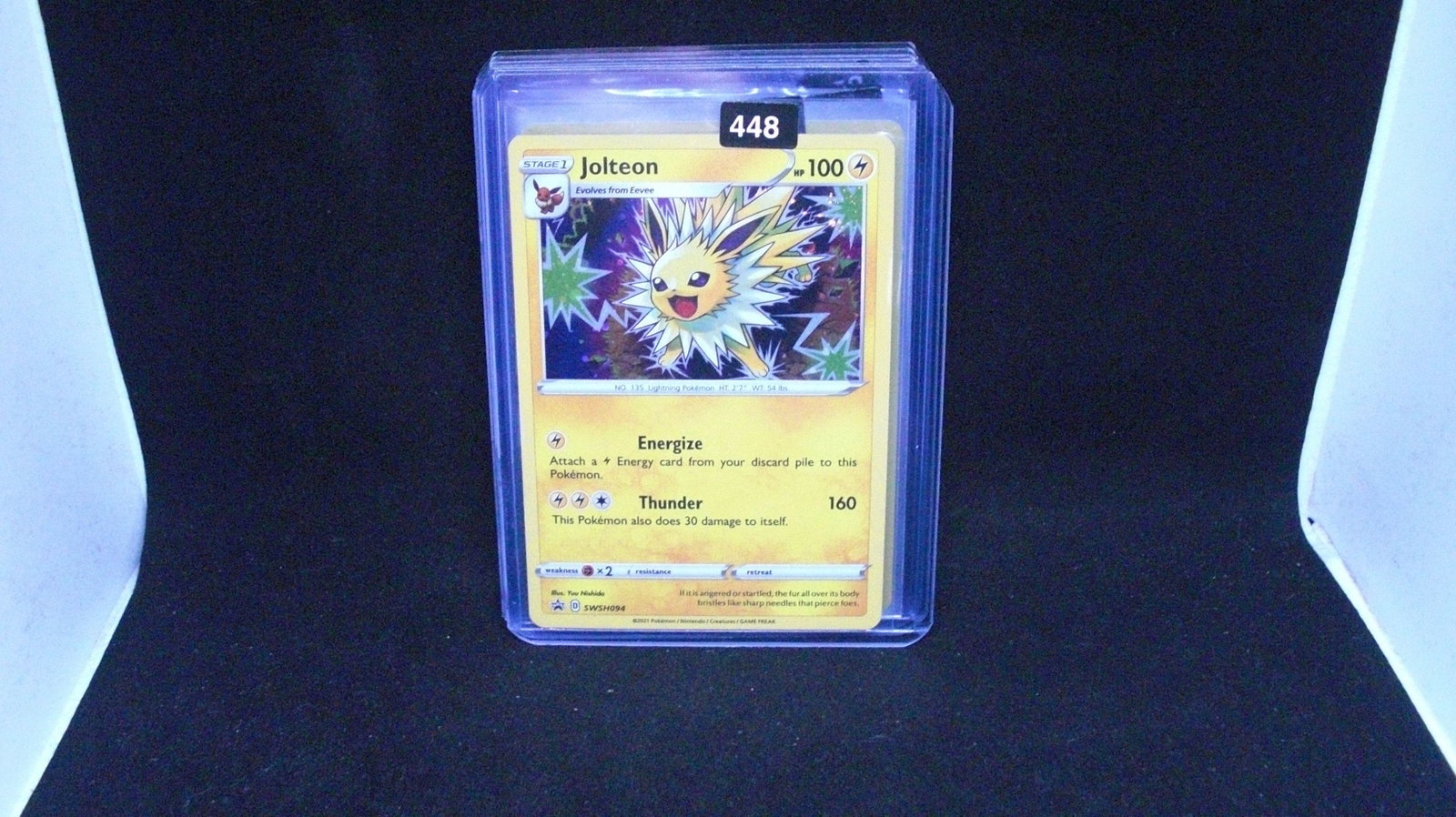 pokemon holo foil card jolteon: in top loader