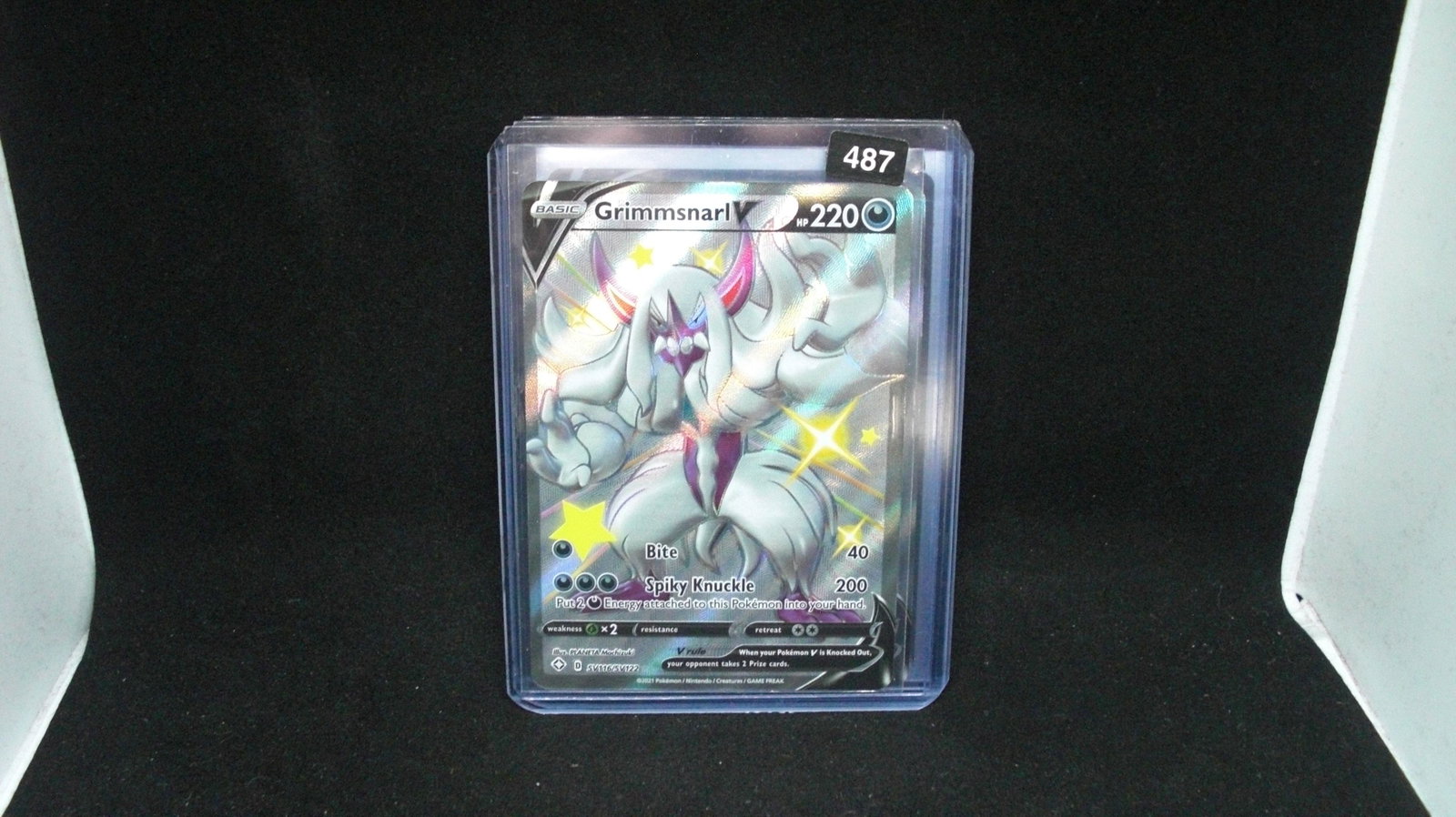 pokemon holo foil card grimmsnarl: in top loader