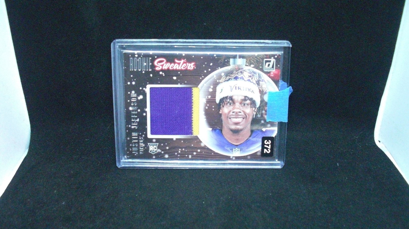 Justin Jefferson rookie holiday sweater card: in top loader