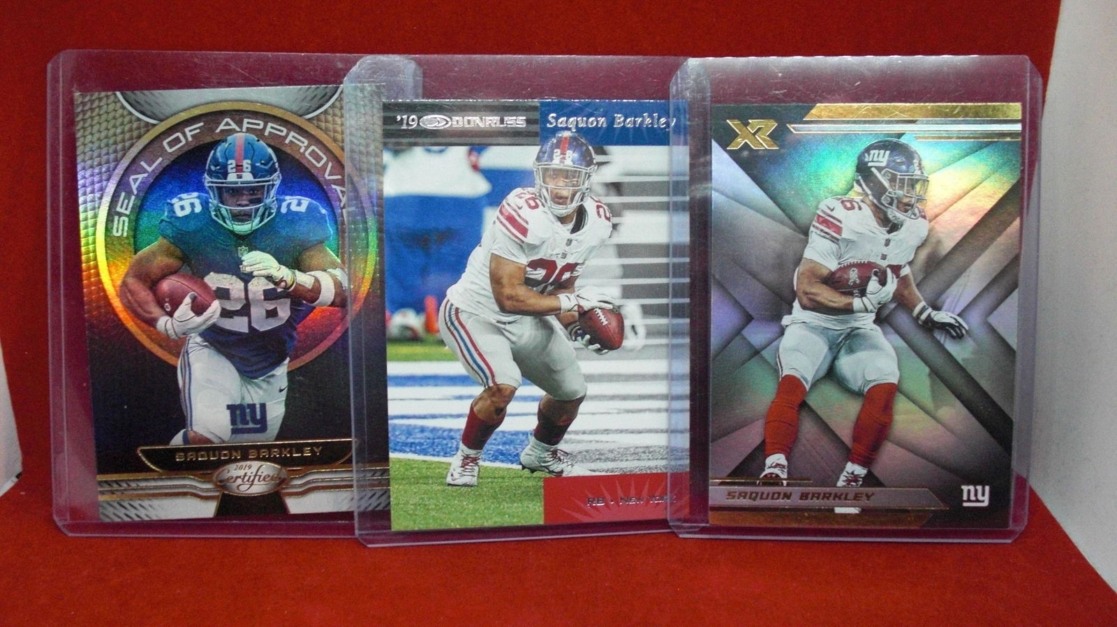 Lot of three saquon Barkley cards (1 of 1)
