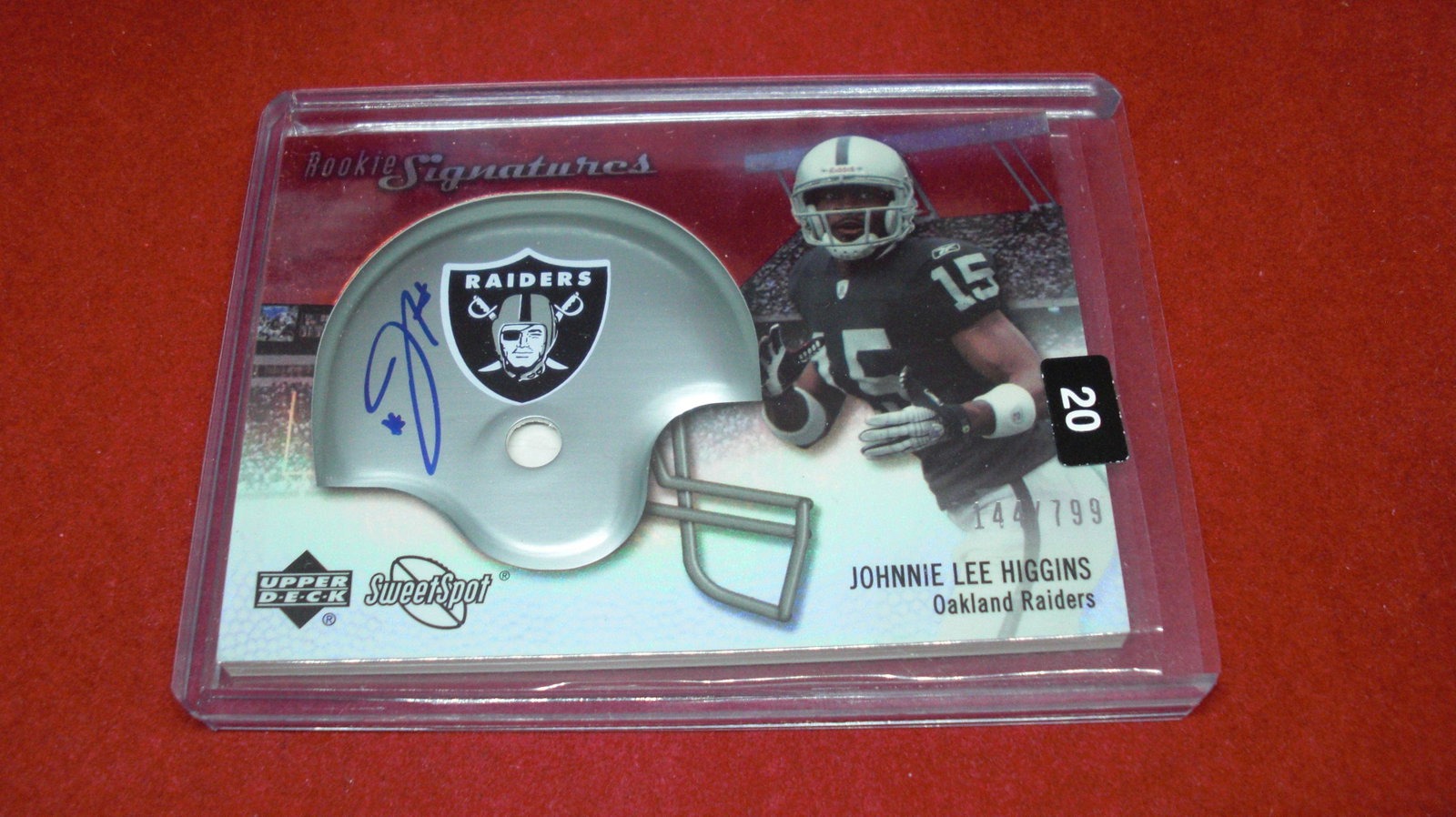 Johnny Lee Higgins Raiders helmet autograph: in top loader