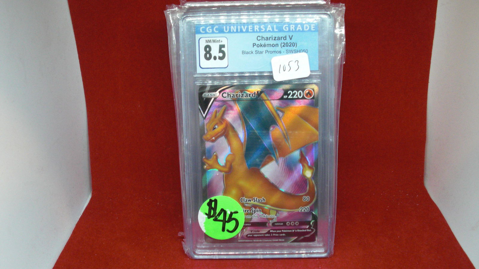 CGC graded 8.5 charizard V pokemon card (1 of 1)
