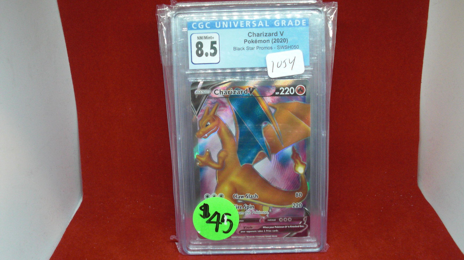 CGC graded 8.5 charizard V pokemon card (1 of 1)