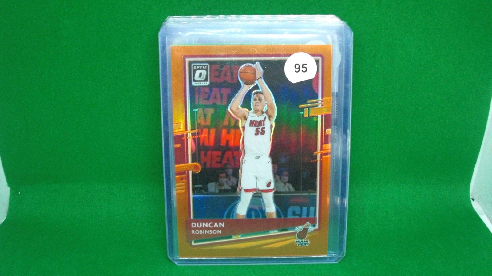 Duncan Robertson orange optic 131/199: in top loader