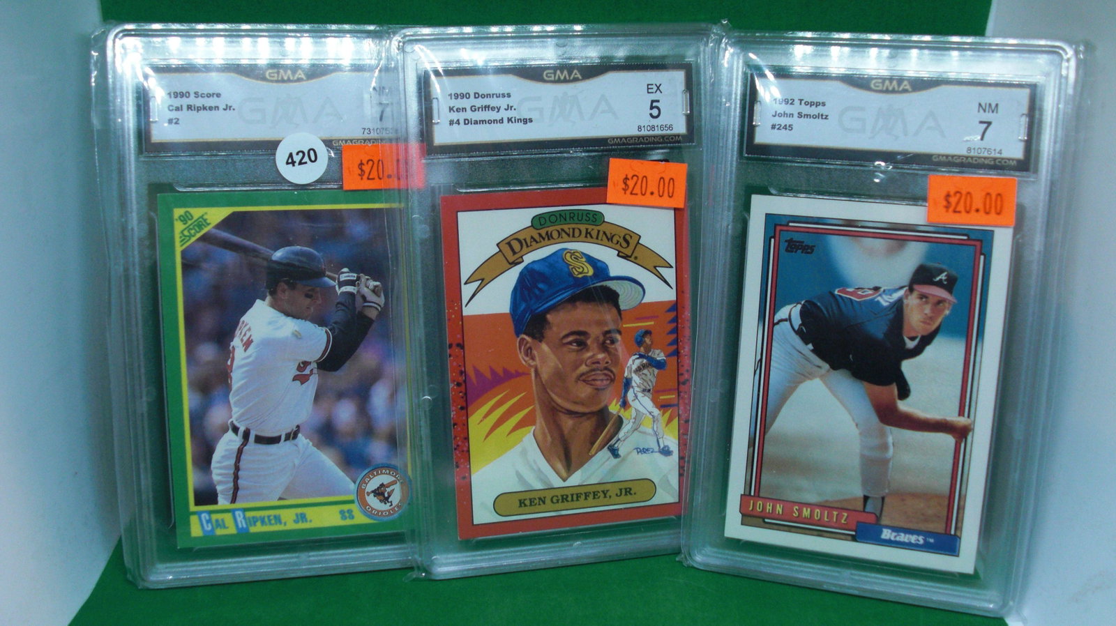 lot of 3 gma hall of famers graded cards: cal ripkem jr, ken griffey jr, john smoltz