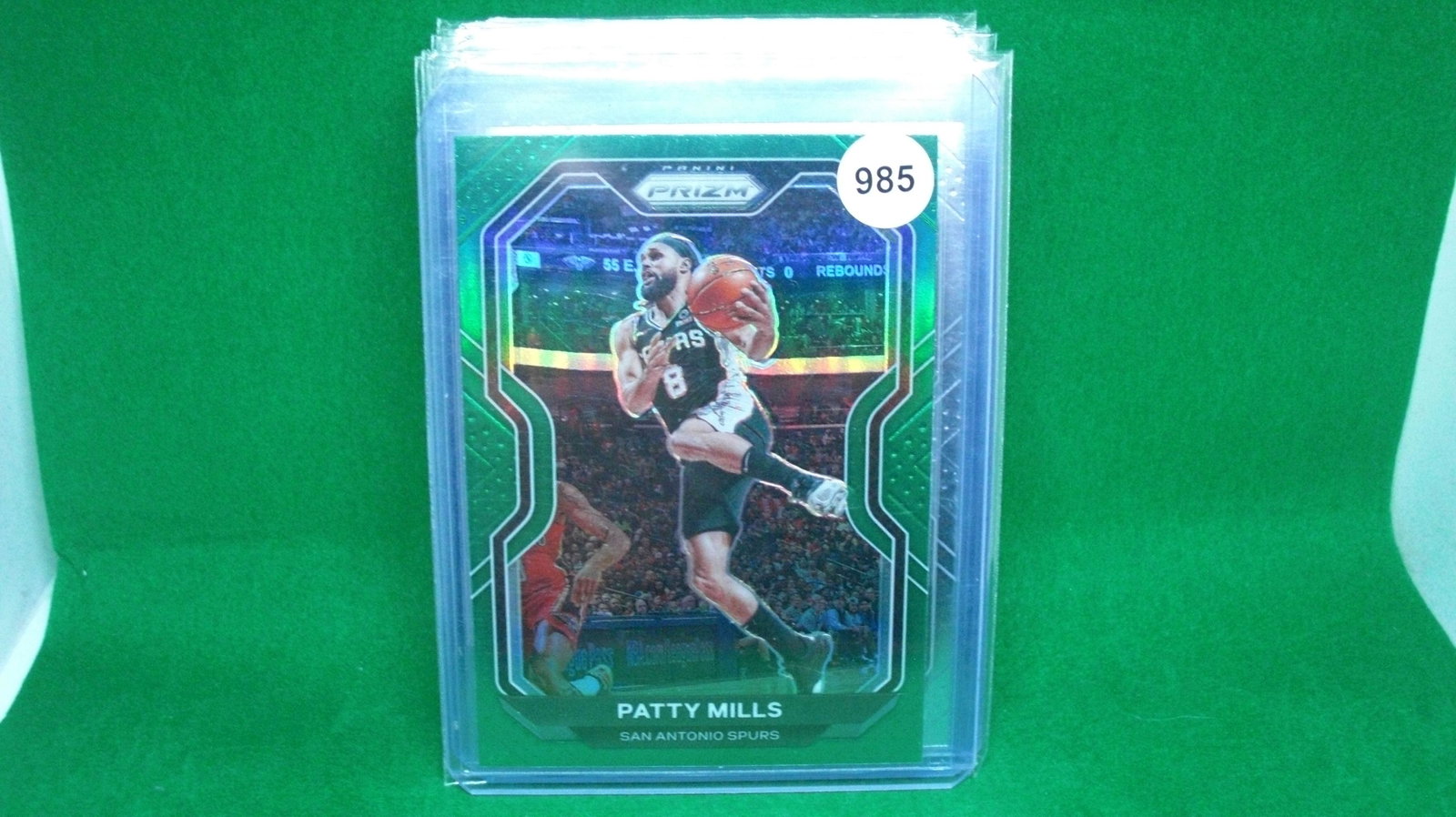 patty mills green prizm: in top loader