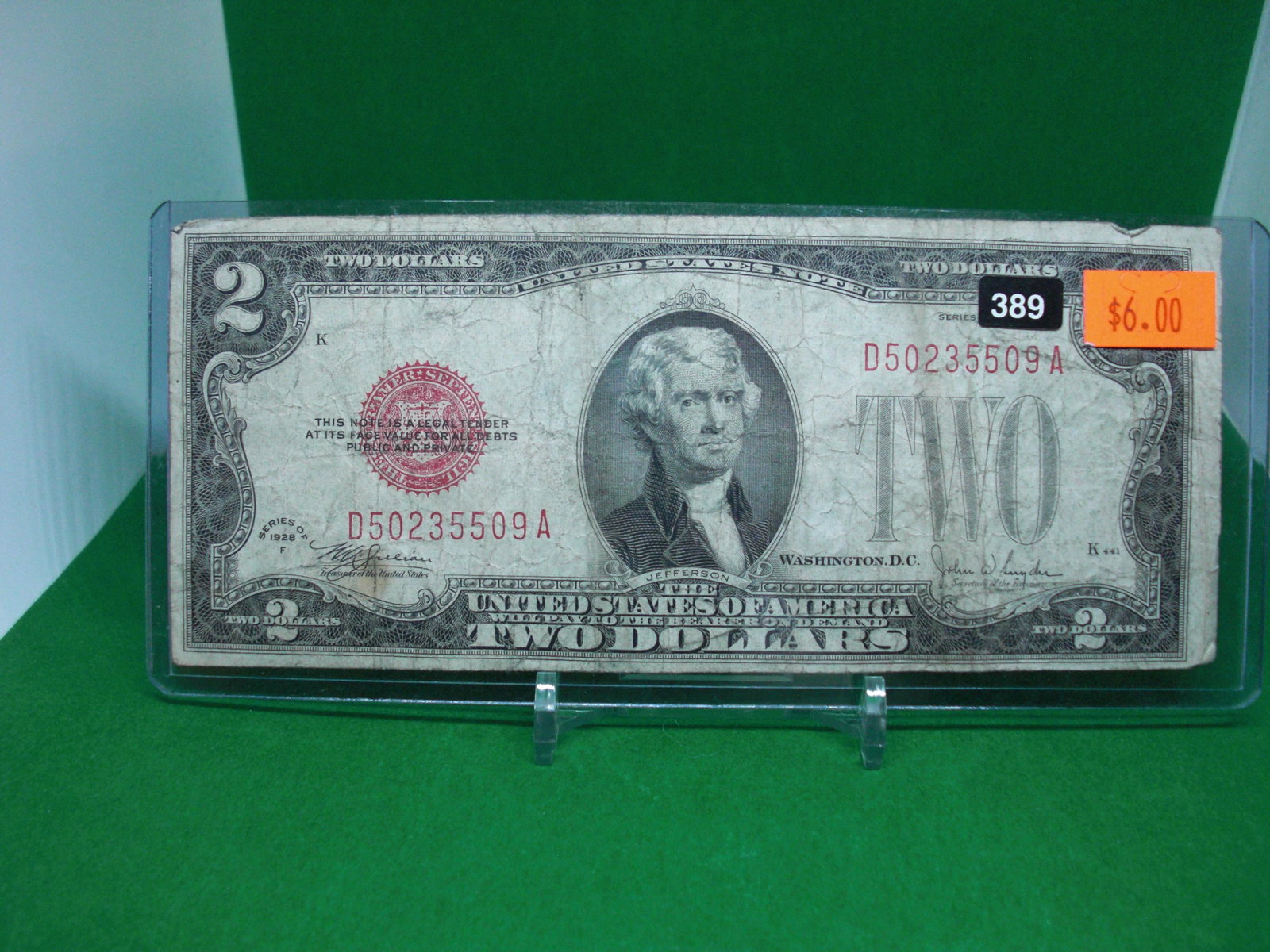 1928f series $2 bill: in top loader