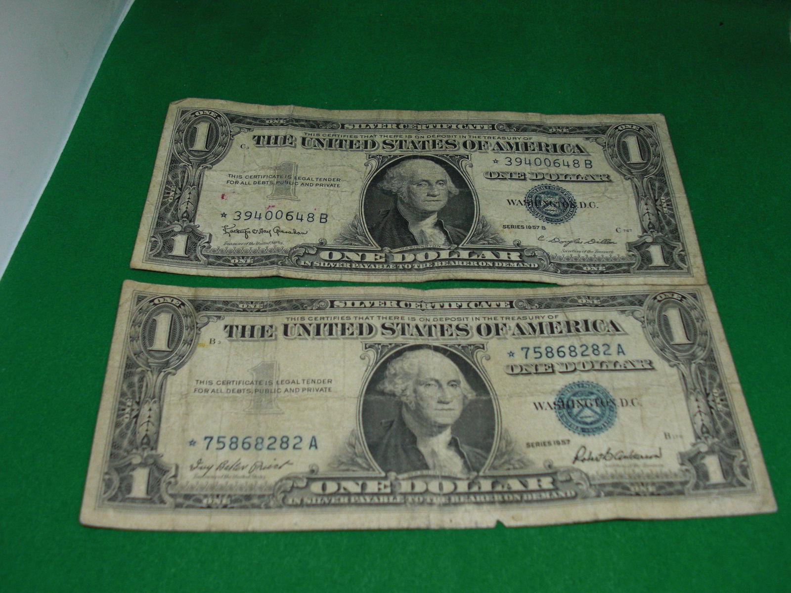 lot of 2 1957 series silver certificate star notes (1 of 1)