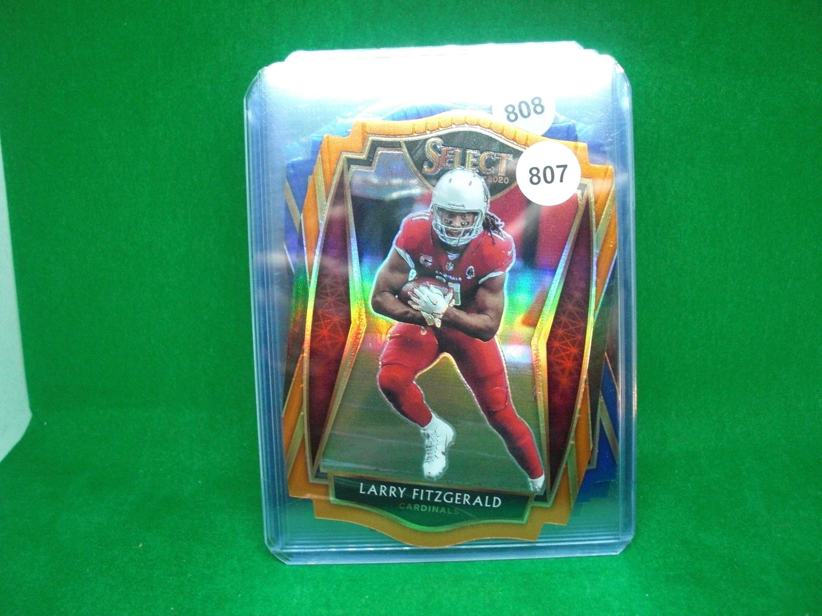 Larry Fitzgerald orange die cut: in top loader
