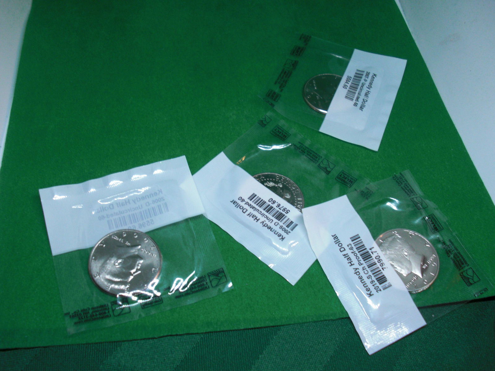 lot of 4 kennedy unc half dollars (1 of 1)