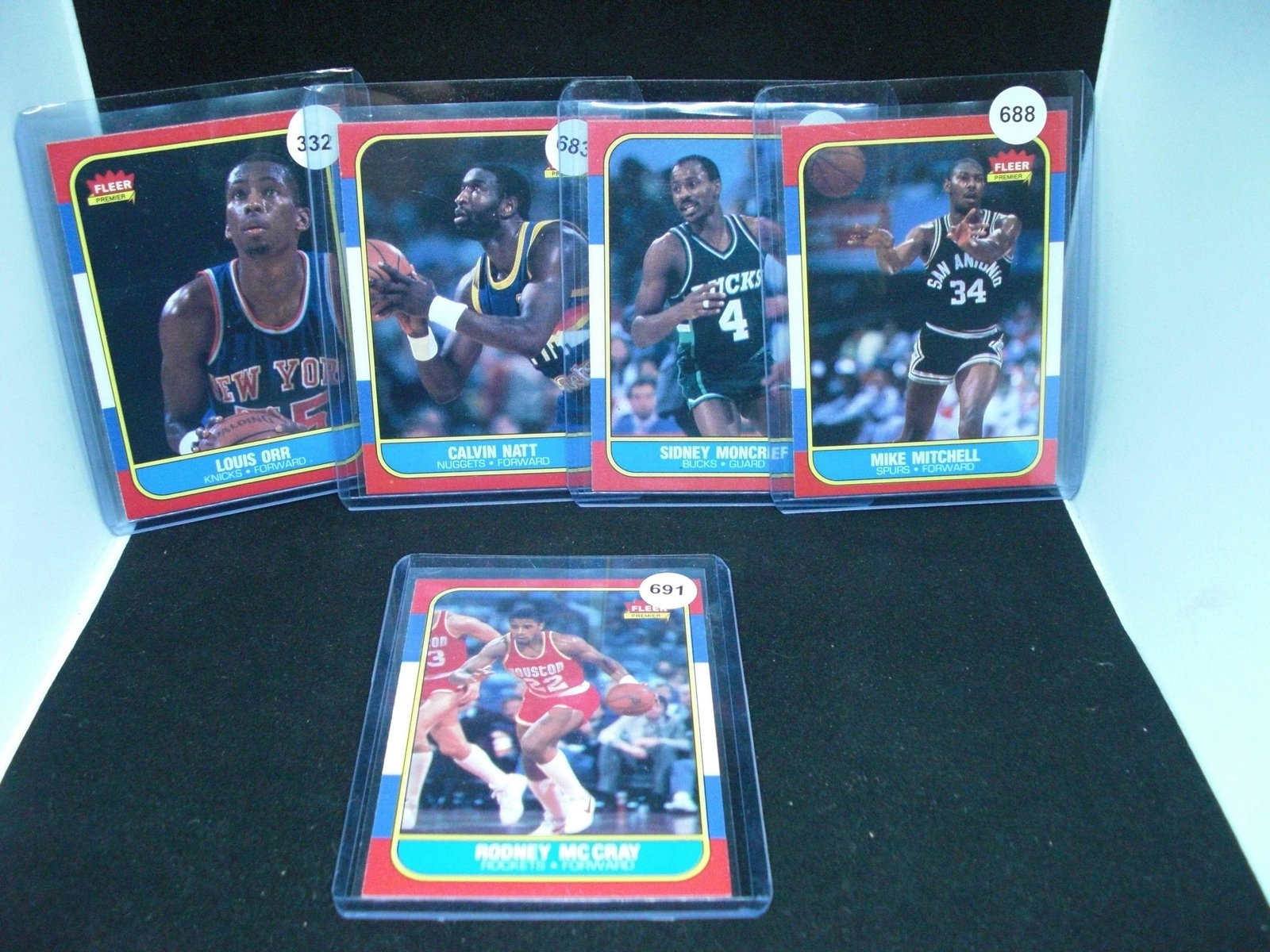 Five 1986 fleer basketball cards near mint: Louis orr Calvin Nat Sidney moncrief Mike Mitchell Rodney mcrary