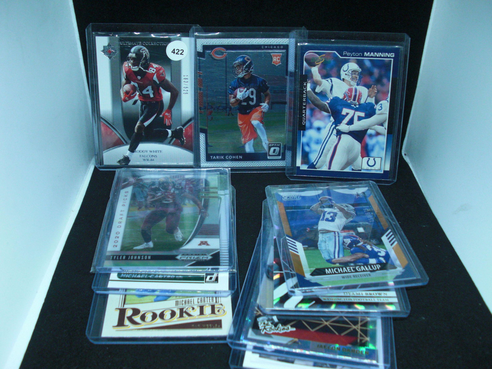 Lot of 10 football cards: With Michael Carter rookie