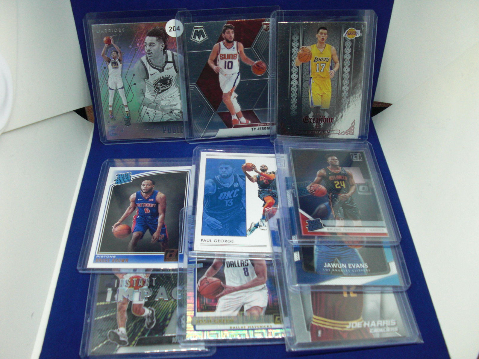 Out of 10 basketball cards with Jordan Poole RC (1 of 1)