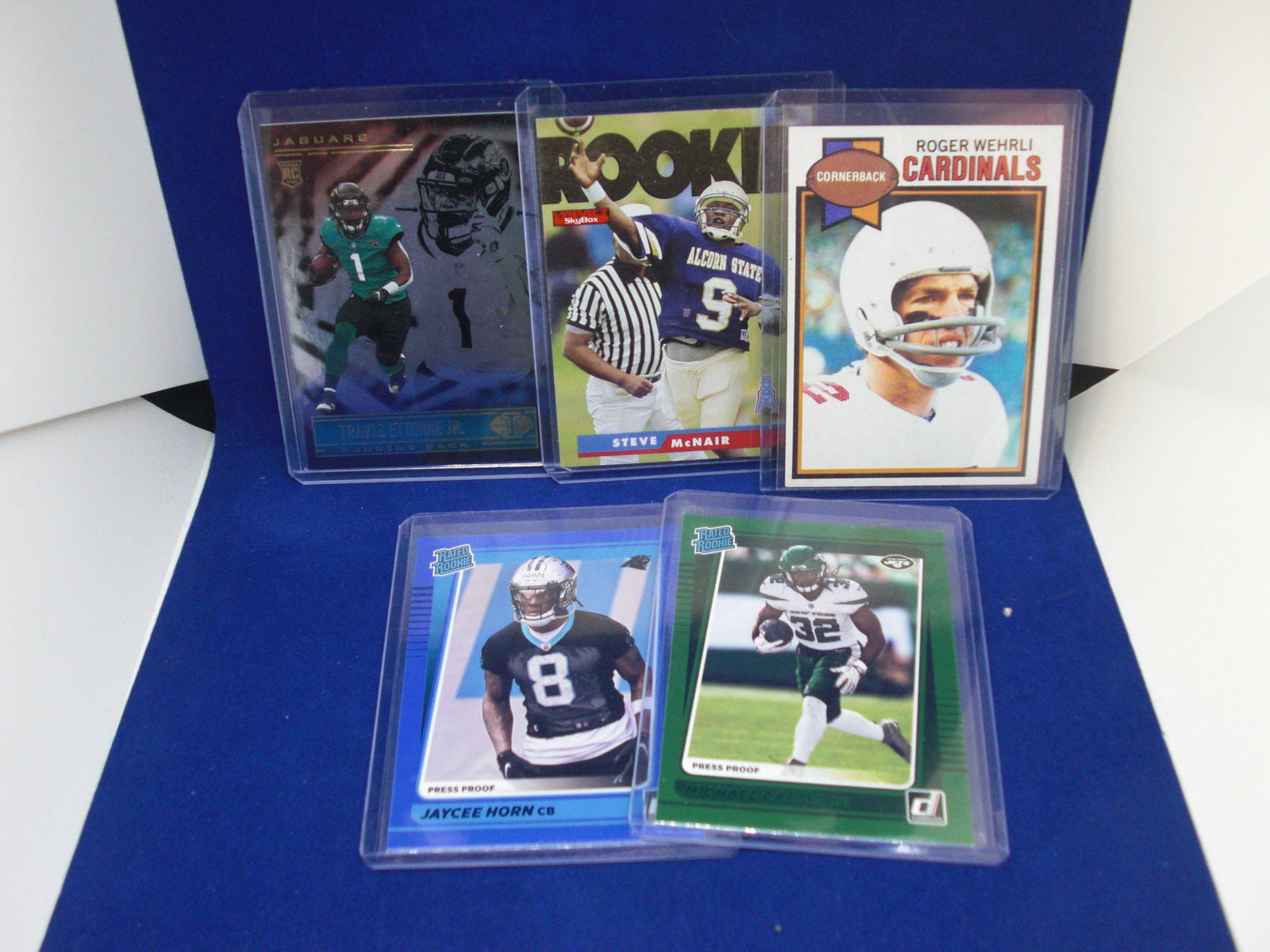 lot of 5 top loaded football cards with roger wherli: lot of 5 top loaded football cards with roger wherli