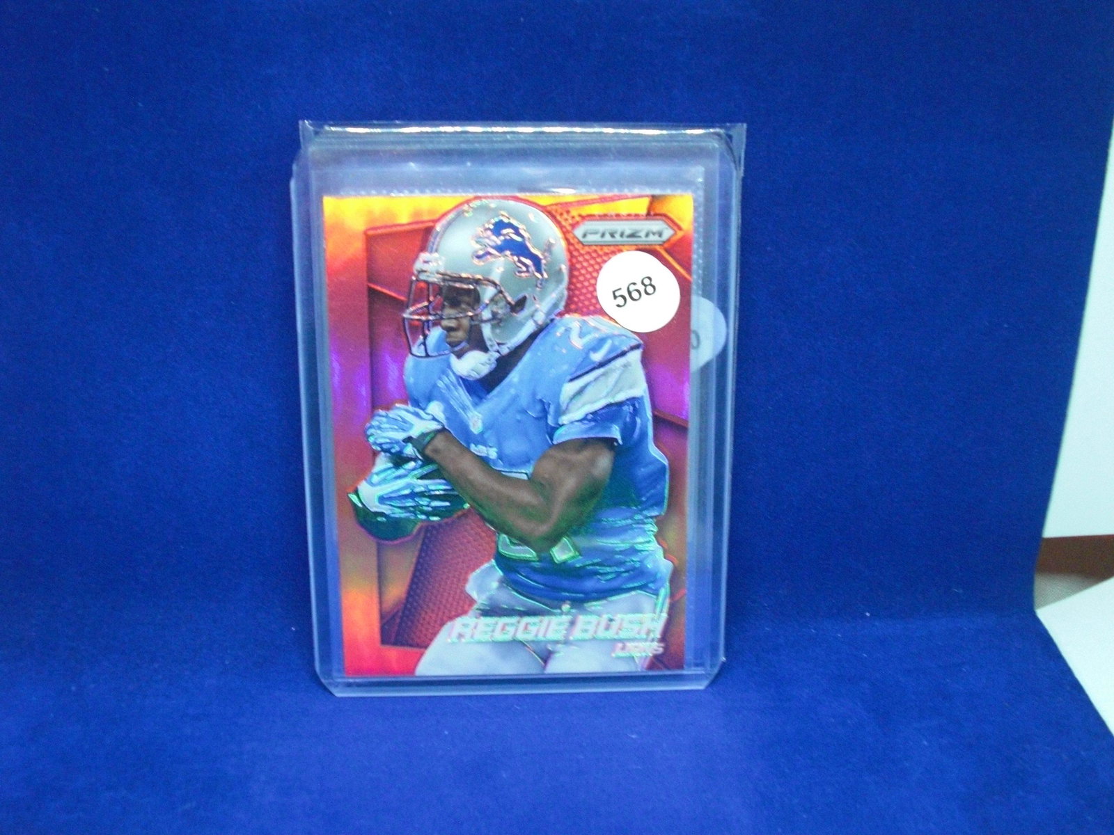reggie bush red prizm: in top loader