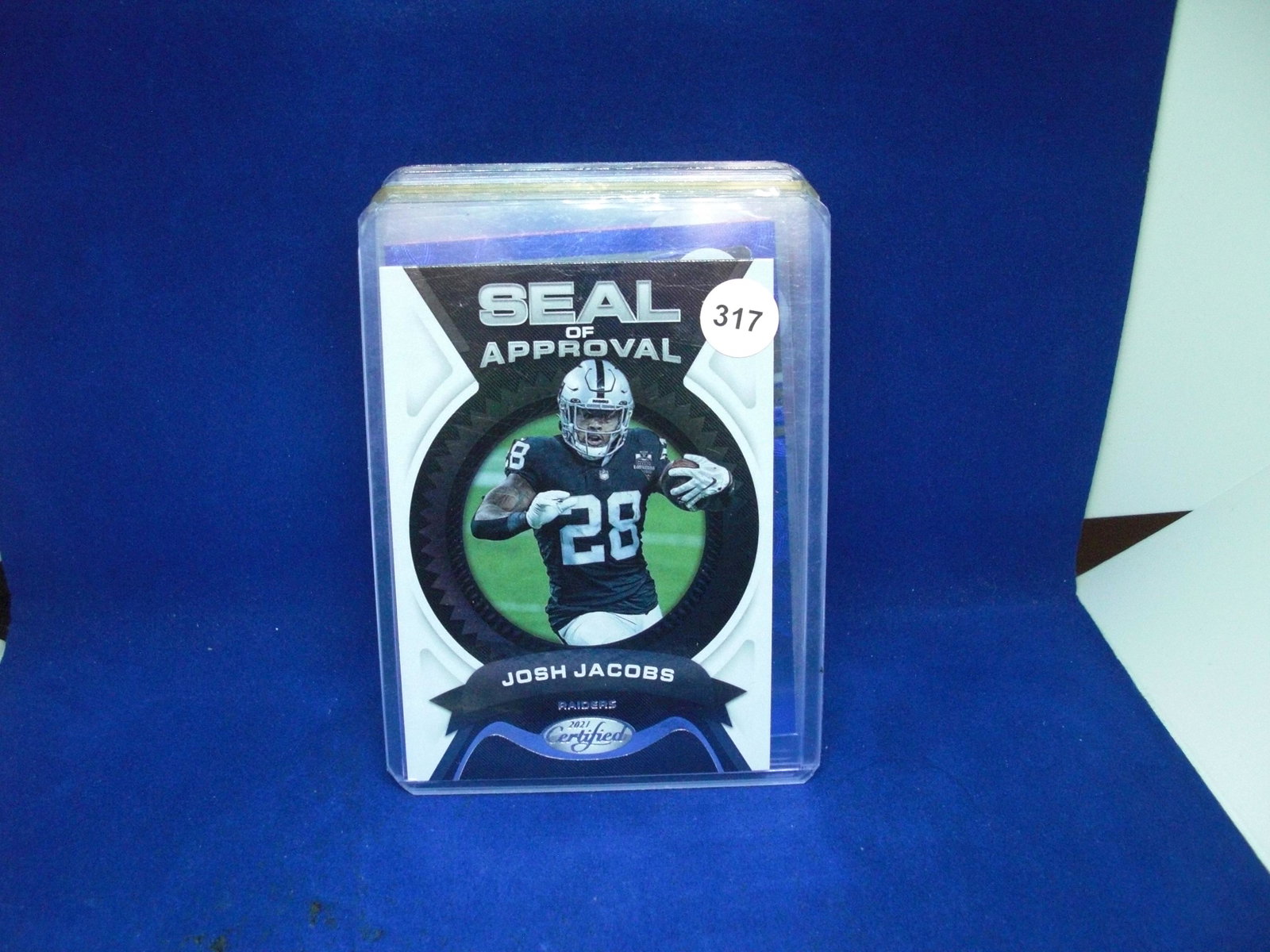 josh jacobs seal of approval: in top loader