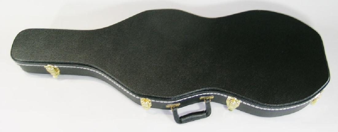 Contemporary Thompson Sub-Machine Gun Case: Contemporary Thompson Sub-Machine Gun Case guitar case style, hard side, egg crate foam interior.