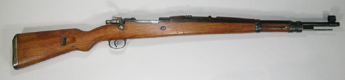 Mauser Model 48 Rifle: Mauser Model 48 Rifle bolt action, 8mm cal., SN-A49539, 23" barrel, folding ladder rear sights, Yugoslavian crest mark at top of receiver. Condition: 80-90% FFL transfer required.