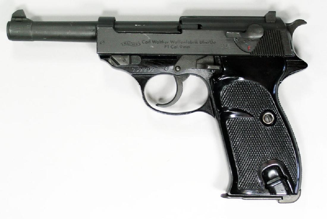 Carl Walther Waffenfabrik Model P1 Semi-Automatic: Carl Walther Waffenfabrik Model P1 Semi-Automatic Pistol 9mm cal., SN-262292, 5" barrel, one 7-shot magazine, Imported by PW Arms Redmond, WA. Condition: 90-95% FFL transfer required.