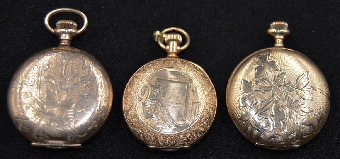 Three Antique Aesthetic Movement Hunter Case Pocket: all gold filled; all American Waltham, serial #4364451, 1 7/16" dia.; #8439987, 1 5/8" dia.; and #13777871,1 5/8" dia.