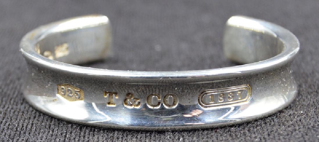 Tiffany & Co. Sterling Silver 1834 Cuff Bracelet: 12mm wide, 2 7/16" long; dated 1997; 1.5 troy