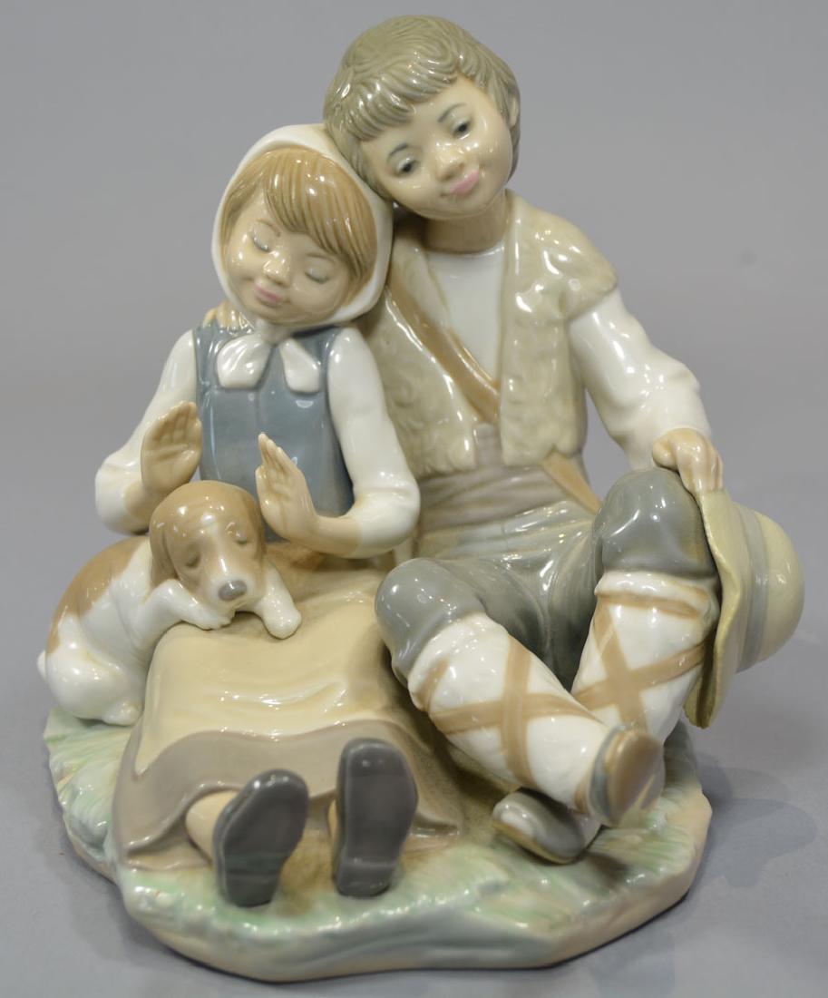 Lladro "Friendship" Figurine #1230: Boy and girl with puppy, 6" high, 6 1/2" base