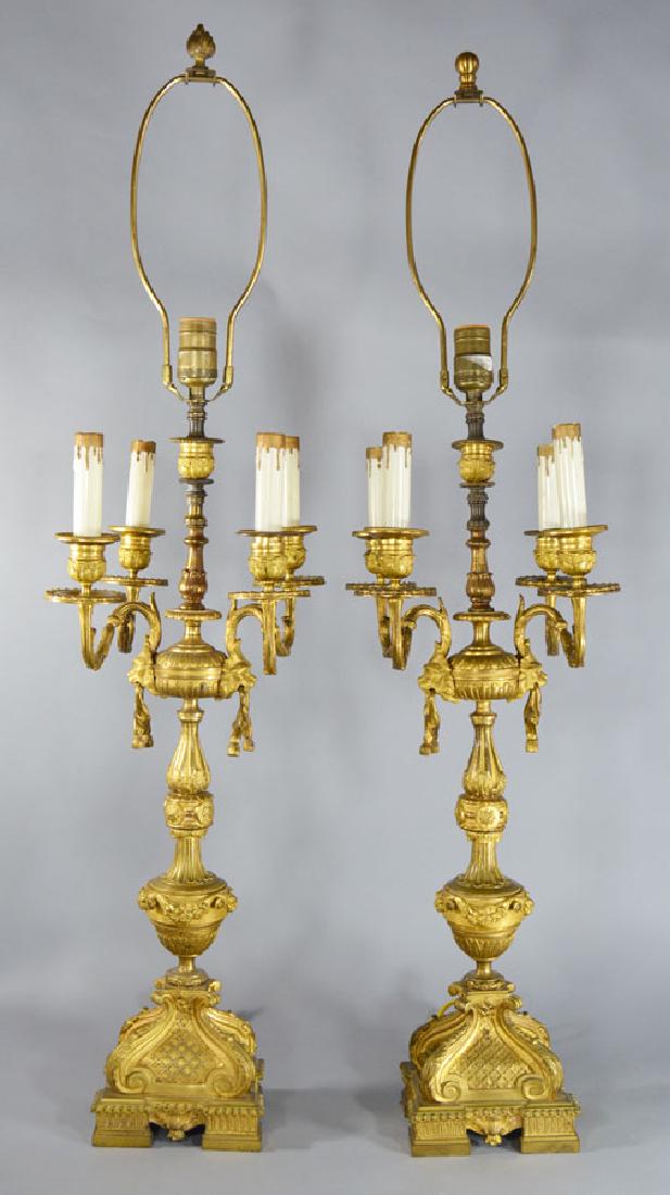 Pair of French Ormolu Candelabra Lamps: Having Lion head and scroll decoration, 24" high, 37 1/2" high overall.